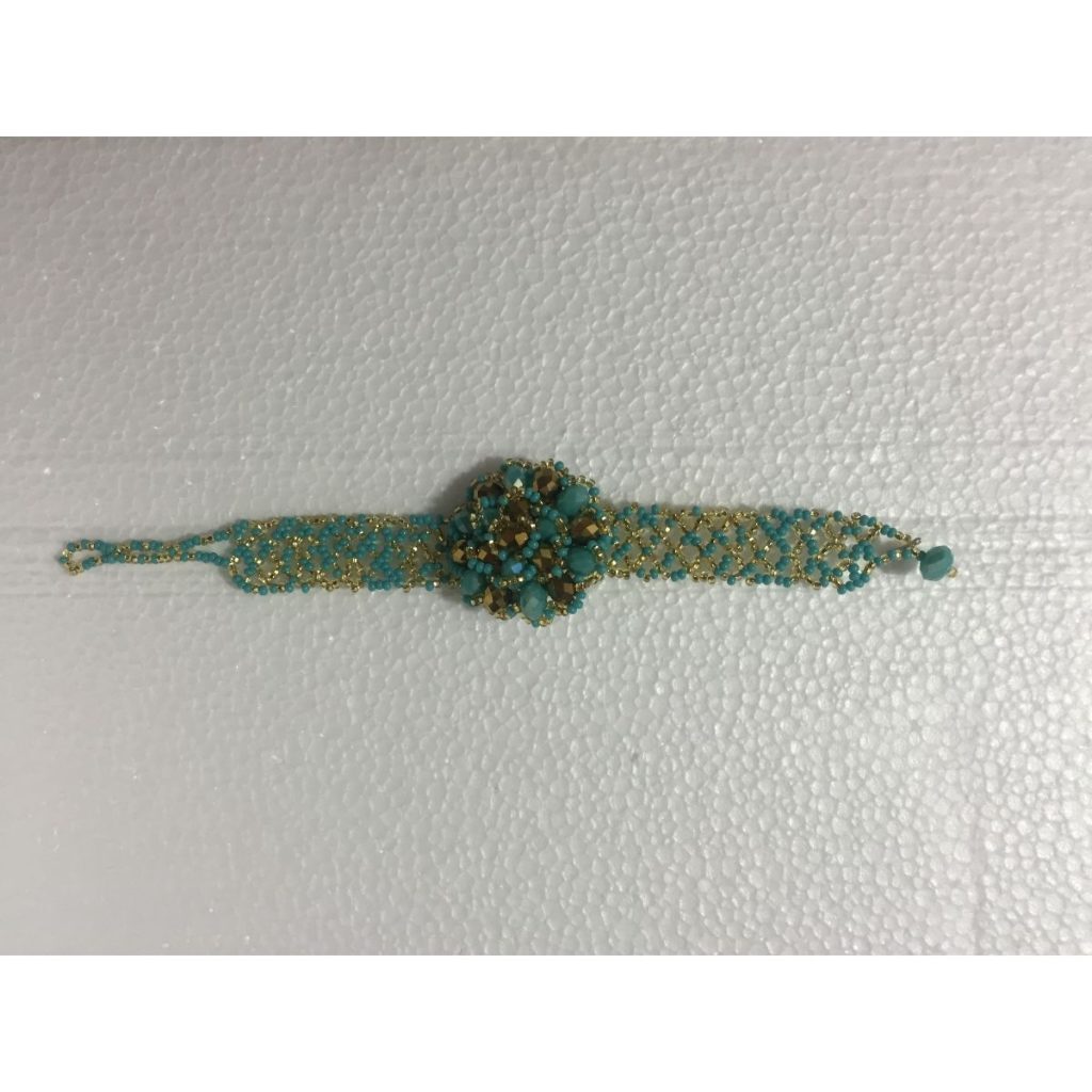 Pulsera artesanal de perlas - Imagen 1